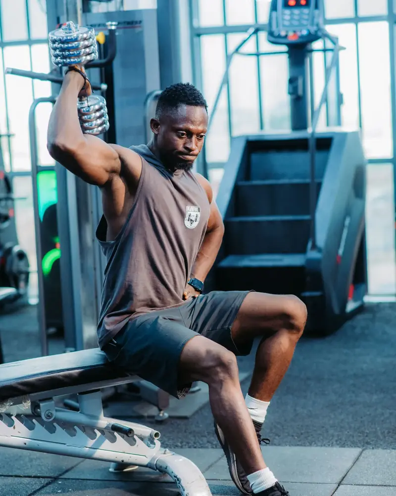 Portrait of Adeosun Emmanuel, strength & fitness coach at Savfol Fitness
